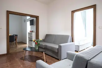 Image de Three bedroom duplex apartment with small dining room, small living room and kitchen