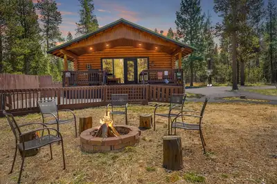 Image de Log Cabin in the Pines with 3 Kings + Bunks, Bikes, Ac, Games and Hot Tub - Wdk09