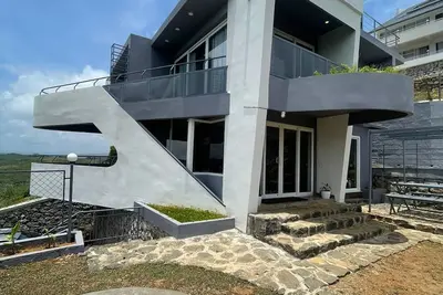 Image de Izzat Inn Villa, Parunthumpara, A pet friendly mountien view villa. . .