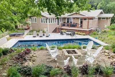 Image de Relaxing home with private pool, hot tub, game room, & fireplace