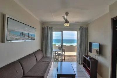 Image de Wake up to the tranquil sight and sound of waves crashing against the shore.