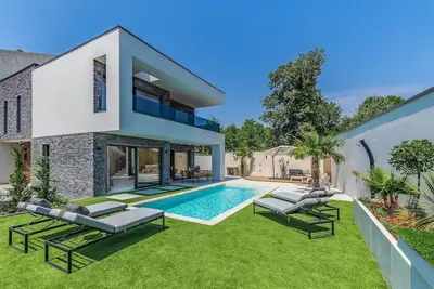 Image de Belle maison à Medulin avec sauna