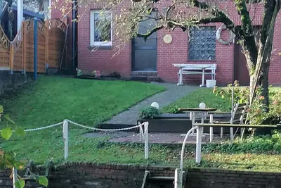 Image de Ferienhaus am Kanal