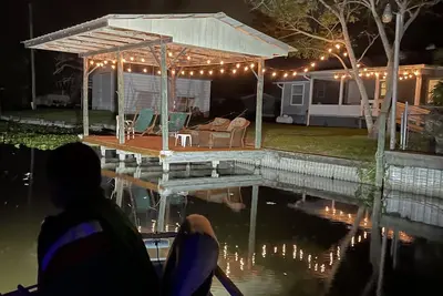 Image de Water view Home with Dock on  Canal with access to Lake!