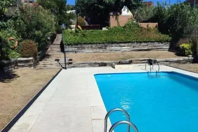 Image de Duplex con Piscina en RubĂ