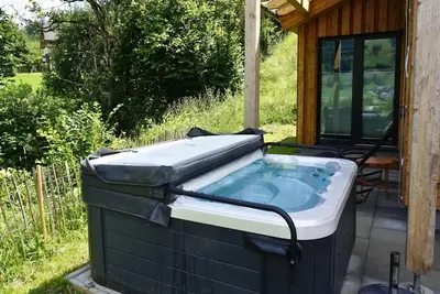 Chalet avec sauna et bain à remous