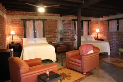 Cabin C Las Orquideas, rustic and comfy, right off highway, we accept pets