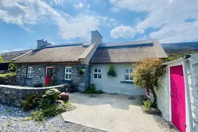 Image de Old Thatch Cottage in the Burren views over Galway Bay on the Wild Atlantic Way