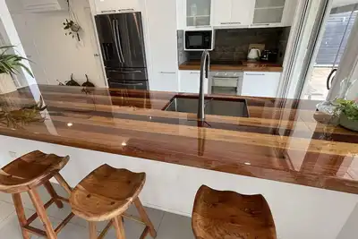 River front property, huge yard and pool, 2km from the beach.