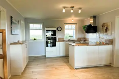 Image de Haus am See mit Kamin und Tischkicker. Haustierfreundlich! Wlan. Neu Renoviert