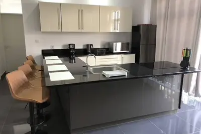 Image de A 10mins de la plage de Pereybere, Appartement modern avec un grand séjour.