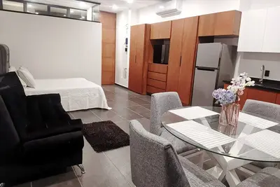 Cozy loft, just half a block from the Malecon, with a pool.
