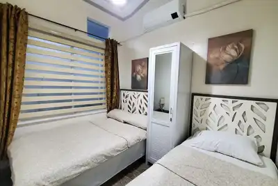 Image de Airconditioned 2 Bdrms, free parking, in the midst of Tayug Town Proper.