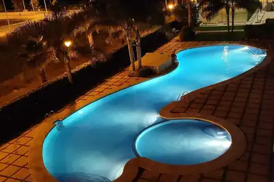 Image de Lovely apartment next to the beach, with surroundings river and mountain views.