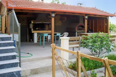 Image de Homerez - Maison charmante avec vue sur la montagne Ă Manthirea