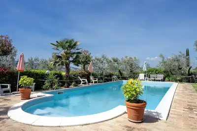 Image de Agritourisme \"Il Grappolo E La Rosa - Sagrantino\" avec piscine partagée, terrasse privée et Wi-Fi
