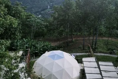Image de Enjoy the sounds of nature and the waterfall when you stay in this unique place.