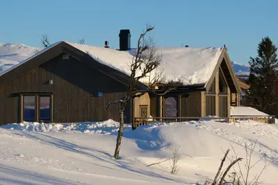 Image de New mountain cabin with panoramic view, sauna, ski-in -ski-out