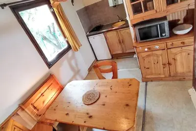 Image de Homerez - Bungalow confortable à Escaro avec piscine partagée