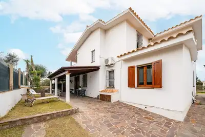 Image de Maison de vacances 'Brezza Di Mare' avec vue sur la mer, terrasse privée et climatisation