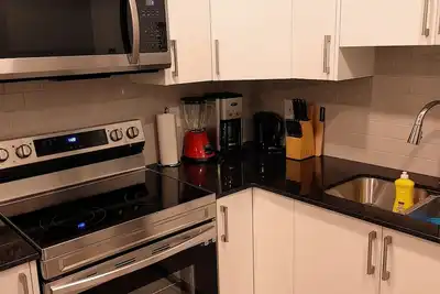 Image de Warm & Brand New sparkling 2 bedroom basement suite in Carrington, Nw, Calgary