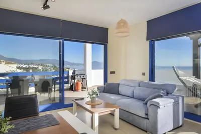 Image de Appartement de vacances \"El Hacho\" avec vue sur la mer, piscine partagée et Wi-Fi