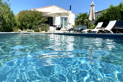 Image de Jolie villa avec piscine chauffée à 450 m de la plage!