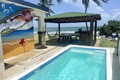 Image de Oceanfront Suite with unique and amazing sunrises. Built memories with us. . .