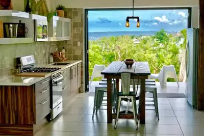 Minutes from the beach, modern home with ocean views. Pet friendly!