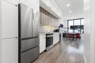 Downtown! Brand New, Modern, Massive Studio with Kitchen + Game Room & Theater.