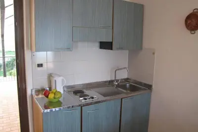 Image de Résidence Villa Margherita appartement d'une chambre avec balcon et vue sur le lac