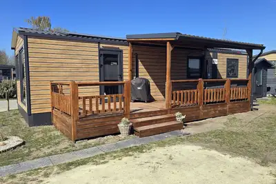 Image de Gemütliches Chalet mit Terrasse und Stellplatz. Haustiere Willkommen