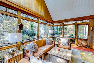 Dog-friendly, hilltop home near the beach with hot tub, firepit & gorgeous porch