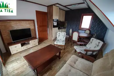 Image de Cozy apartment on a separate floor in a mountain house.