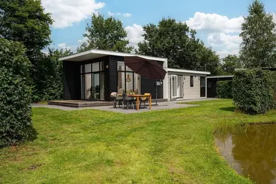 Image de A comfortable forest lodge with hot tub!