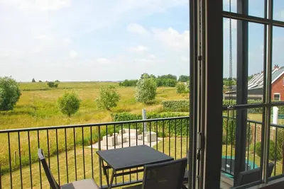 Image de Luxury apartment for 4 people with a sauna and a garden or balcony in a small-scale park on the Zeeland coast
