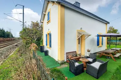 Image de Maison de vacances 'Le Trianon Pavillon' avec terrasse privée et Wi-Fi