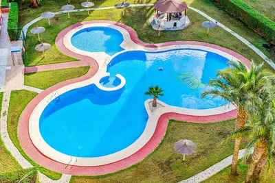 Image de Appartement 'Puerto Mar I Bloque 1 8-1' avec vue sur la mer, piscine partagée et Wi-Fi
