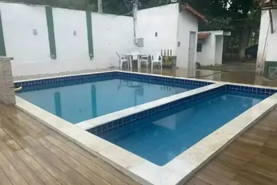 Image de Casa Térrea Aconchegante de 1/4 a 300 Metros da Praia em Condomínio Fechado