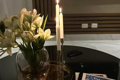 Image de A Luxe family stay that is 5 minutes from the beach and a step away to the pool.