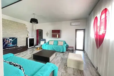 Image de Maison Familiale H 51 - Centre Budoni - proche commerces et plage -