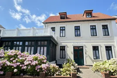 Image de Küstenidylle Pur: Helle Ferienwohnung im Herzen von Borkum
