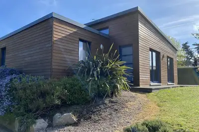 Image de 213 - Charmante maison en bois proche de la plage