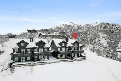 Image de Maison confortable à åseral avec vue.