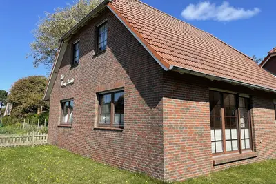 Image de Ruhepol am Meer: Gemütliche Ferienwohnung in Grüner Umgebung