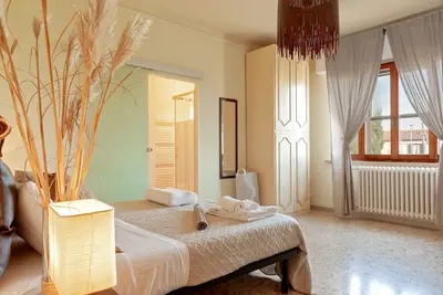 Image de Appartement 'Le 7 Calle Con Balcone' avec terrasse privée, jardin partagé et Wi-Fi