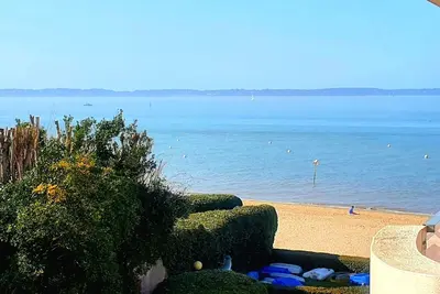 Image de Vue mer Arcachon Pereire. T1 bis sur plage. Tout confort, parking, vélos WiFi. . .