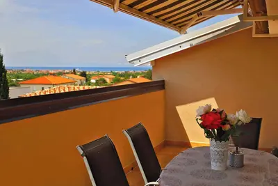 Image de Appartement de vacances avec balcon et climatisation