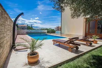 Image de Maison de 2 chambres en bord de mer à.