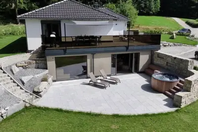 Image de Chalet 'Ferienchalet Schneiders' avec terrasse privée, jardin privé et Wi-Fi